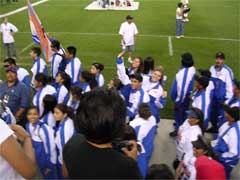Team CRIT enters the stadium for opening ceremonies.